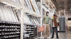 father and son wearing masks and shopping at a home improvement store